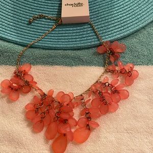 Peach in color casual necklace.